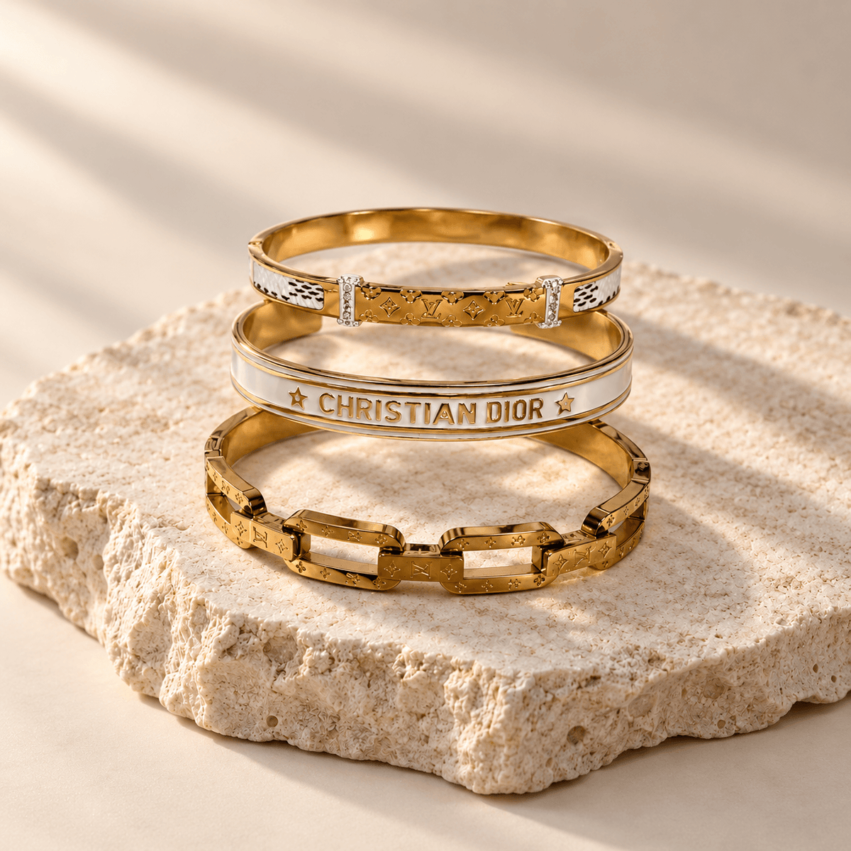 Luxury designer-inspired gold bangles from 876LUXE.